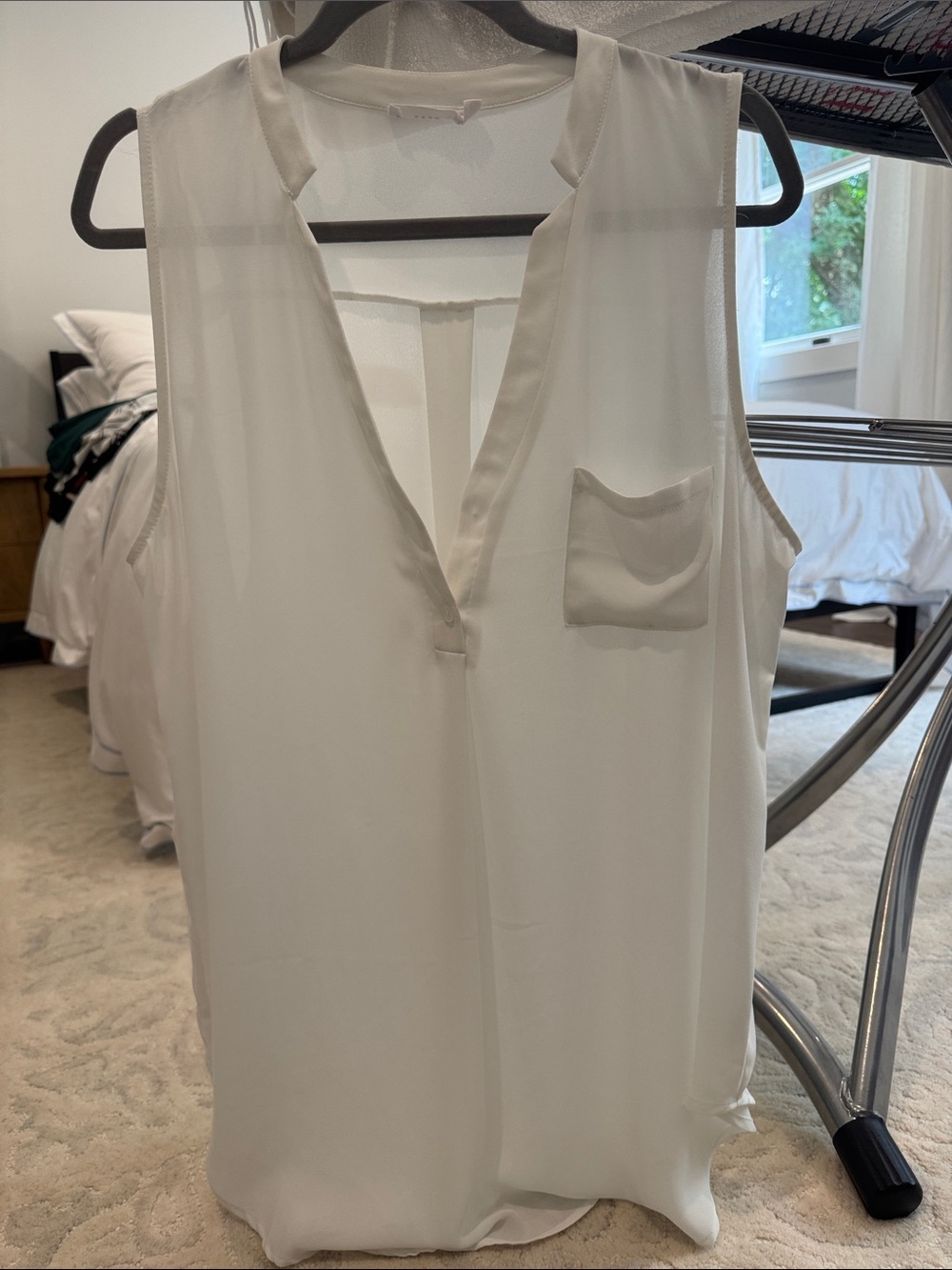 Lush White Sleeveless V-Neck Blouse